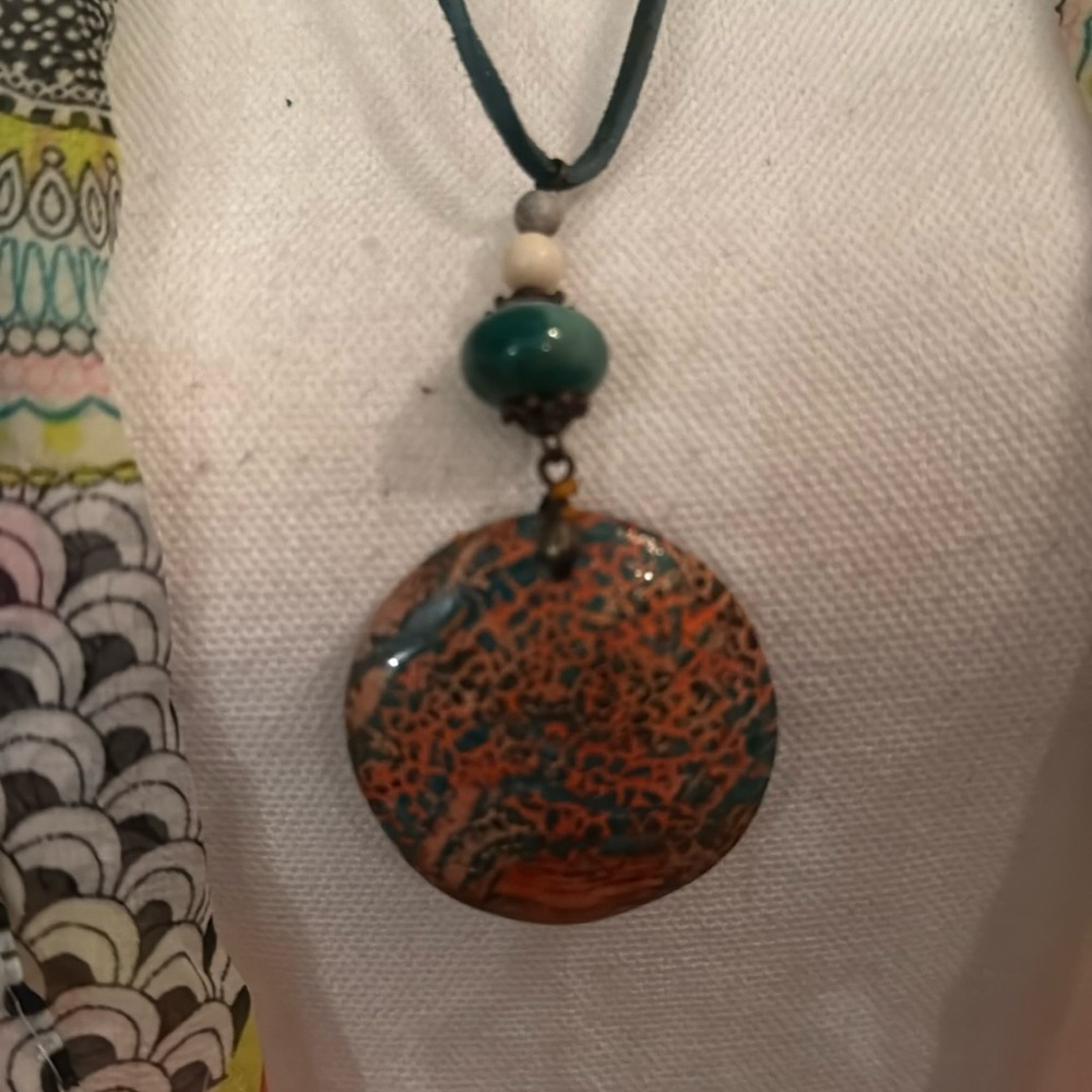 handmade orange & teal pendant painted stone w smaller natural stones